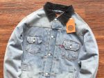 STUSSY X LEVIS EMBOSSED TRUCKER DENIM JACKET